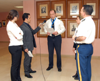Course Member Cdr Gorazd Bartol (SVN N, center) playing the role of NATO Spokesman during a mock interview as part of the CMX-NMDX exercise.
