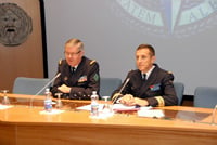 French Chief of Defence Staff Admiral &Eacute;douard Guillaud addresses SC 121  and NRCC 8 during the Eisenhower Lecture (right NDC Faculty Advisor Captain Gauthier - FRA N). 