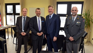  Dr John Manza with NDC Dean Dr Stephen Mariano, Director of NDC Research Division Dr Thierry Tardy, and Colonel Laurent Currit