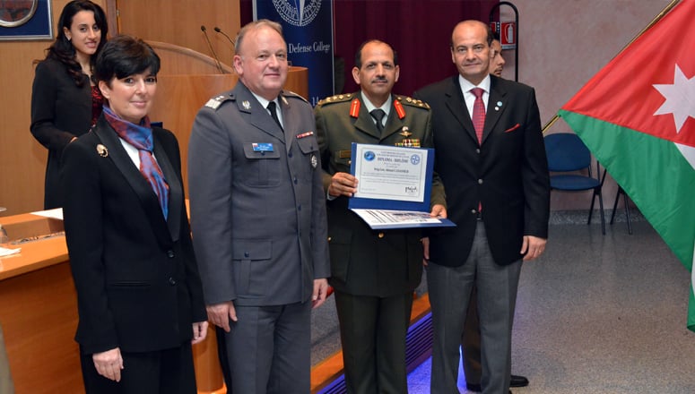NRCC-14 Course President BrigGen Ahmad Lasasmeh receives his graduation diploma from Ambassador AboulEnein, Commandant MGen Bojarski and Dean Dr Daniels Skodnik.