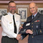 Course Member receives his diploma from Lieutenant General Nielsen