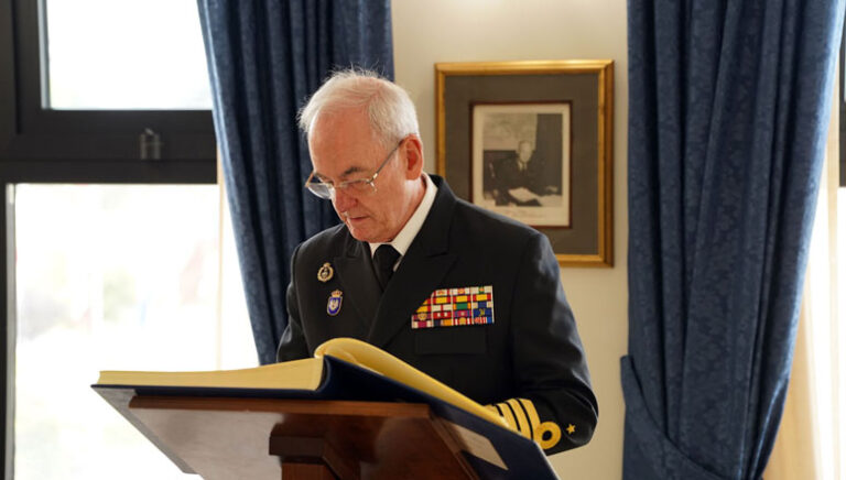 Admiral Teodoro López Calderón signs the NDC guest book