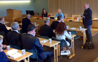 LtGen DALHAUG introduces Ms Anniken HUITFELDT, Chair of the Parliamentary Standing Committee on Foreign Affairs and Defence.