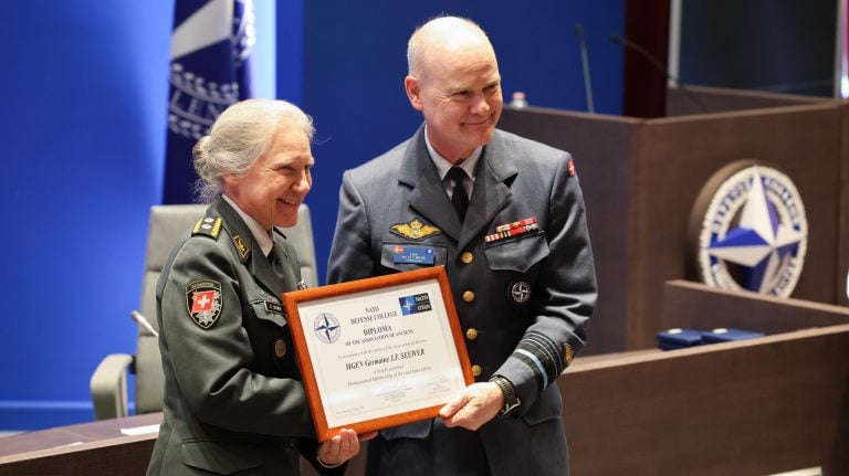 NDC Commandant LGEN Nielsen awards MGEN Seewer the Distinguished Ancien diploma
