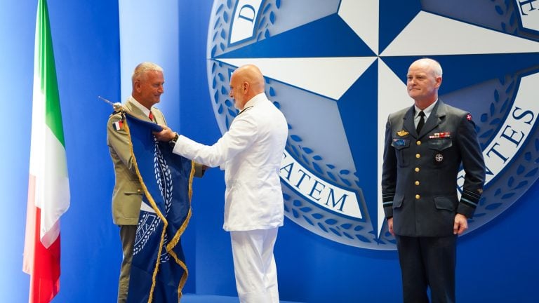 Admiral Cavo Dragone hands over the NDC flag to the incoming NDC Commandant LGEN Goisque
