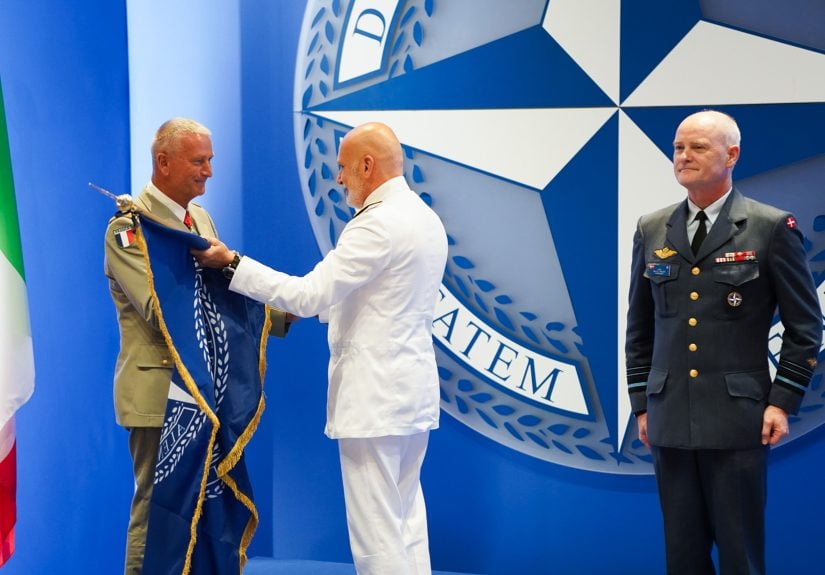 Admiral Cavo Dragone hands over the NDC flag to the incoming NDC Commandant LGEN Goisque